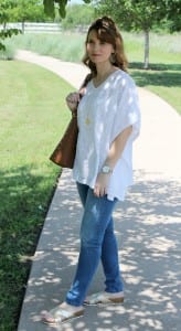 Casual spring outfit idea - White embroidered poncho, light denim, gold sandals from Secret Celebrity and a brown tassel handbag.