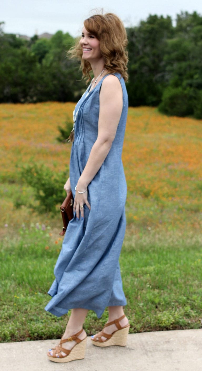 When it comes to the summer heat, a maxi dress is the perfect companion. This Chambray maxi dress features a pintucked waist, which helps this style to not come across as boxy and it gives your body some definition. You can go casual and wear it with a pair of wedge sandals or dress it up a bit and add strappy heels. The great feature about this maxi dress outfit is it doesn’t require much thought to put together a super cute summer outfit. When it comes to the summer heat, a maxi dress is the perfect companion. This Chambray maxi dress features a pintucked waist, which helps this style to not come across as boxy and it gives your body some definition. You can go casual and wear it with a pair of wedge sandals or dress it up a bit and add strappy heels. The great feature about this maxi dress outfit is it doesn’t require much thought to put together a super cute summer outfit.