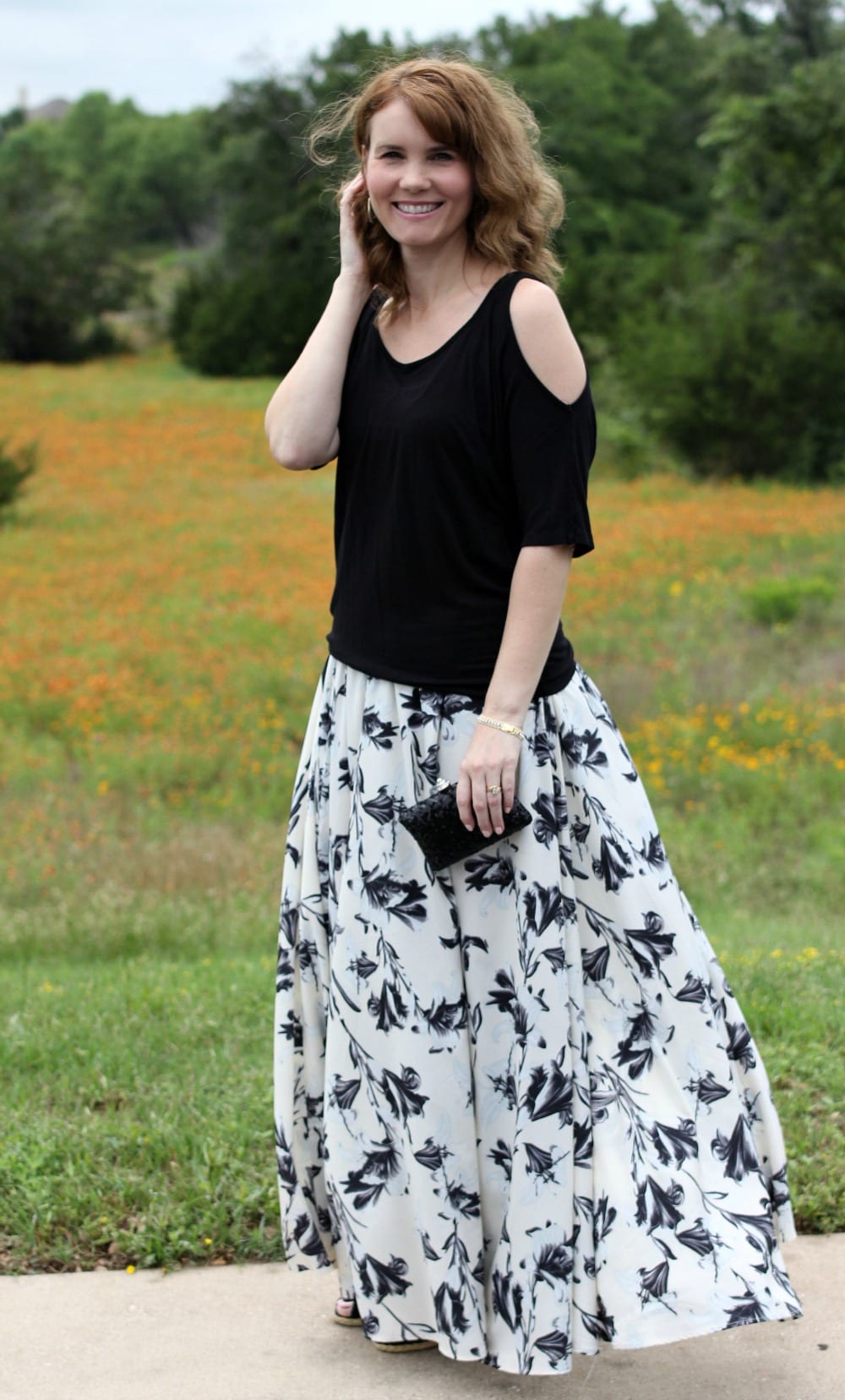 A dressed up maxi skirt outfit - break out the off the shoulder shirt or one with shoulder cutouts, pair it with a maxi skirt, wedges, clutch and some pretty accessories for the perfect date night summer outfit.