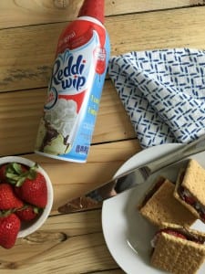 These Strawberry and Hazelnut no-bake s'mores are so incredibly easy to make and even easier to devour. When you combine strawberries, hazelnut spread, whipped cream and graham crackers, you just can't go wrong. No camp fire for s'mores? No problem!