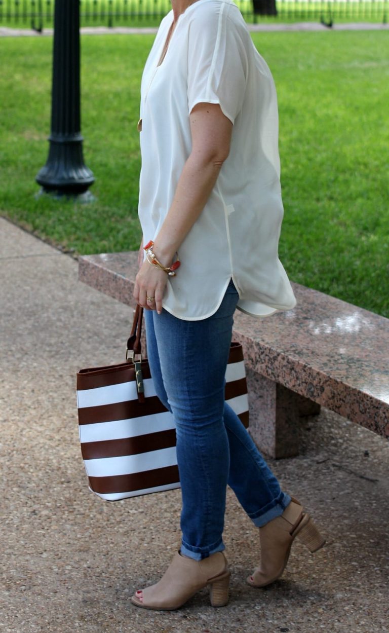 I love tunic tops and they make putting together an outfit I feel good in so easy. This classic tunic from J. Jill is paired with light denim, nude peep toe booties and a striped tote bag. I love tunic tops and they make putting together an outfit I feel good in so easy. This classic tunic from J. Jill is paired with light denim, nude peep toe booties and a striped tote bag.