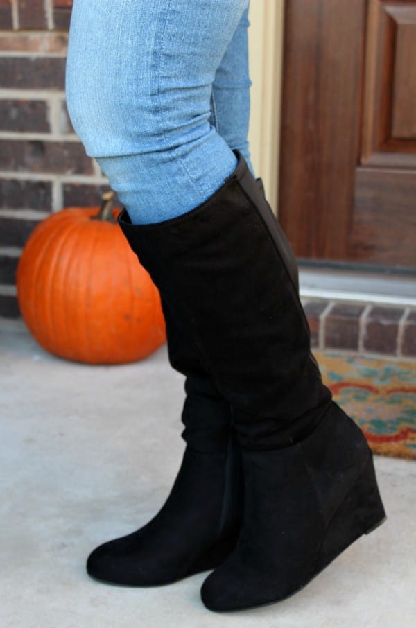 An outfit perfect for your fall fashion needs. The tall wedge boot is very versatile, allowing you to dress it up or down. It looks just as great with a dress for going out or an event, as it does with jeans and a cute shirt.