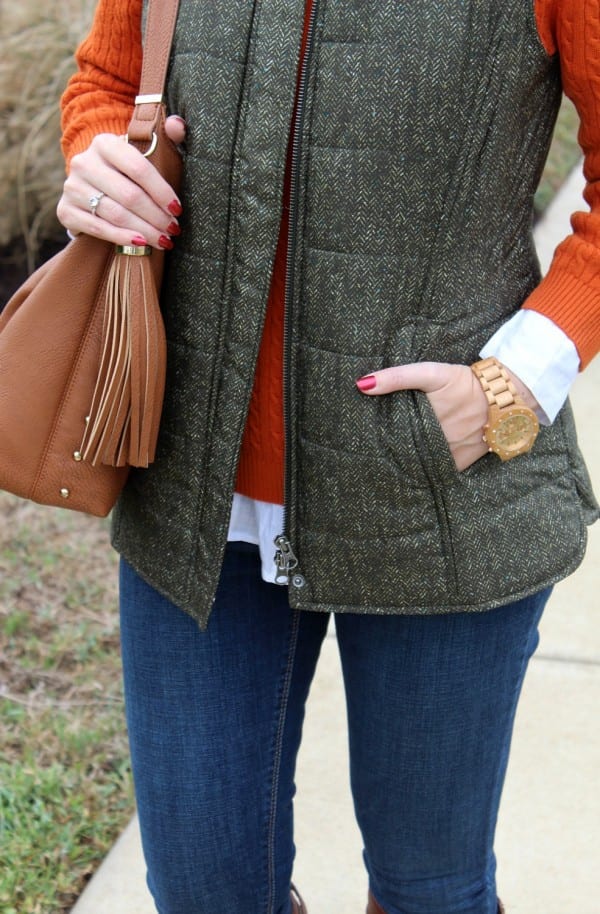 Dressing for fall and winter is all about layering. This fall outfit idea not only features the colors of season, but also features layers I love. Pair a crisp white button up with a cable knit sweater, quilted vest, your favorite skinny jeans and riding boots.