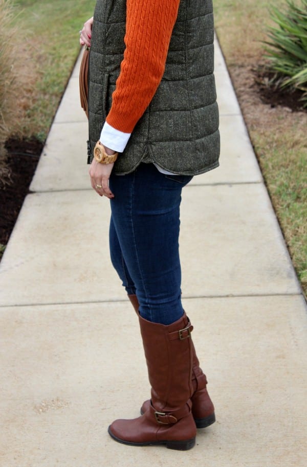 Dressing for fall and winter is all about layering. This fall outfit idea not only features the colors of season, but also features layers I love. Pair a crisp white button up with a cable knit sweater, quilted vest, your favorite skinny jeans and riding boots.