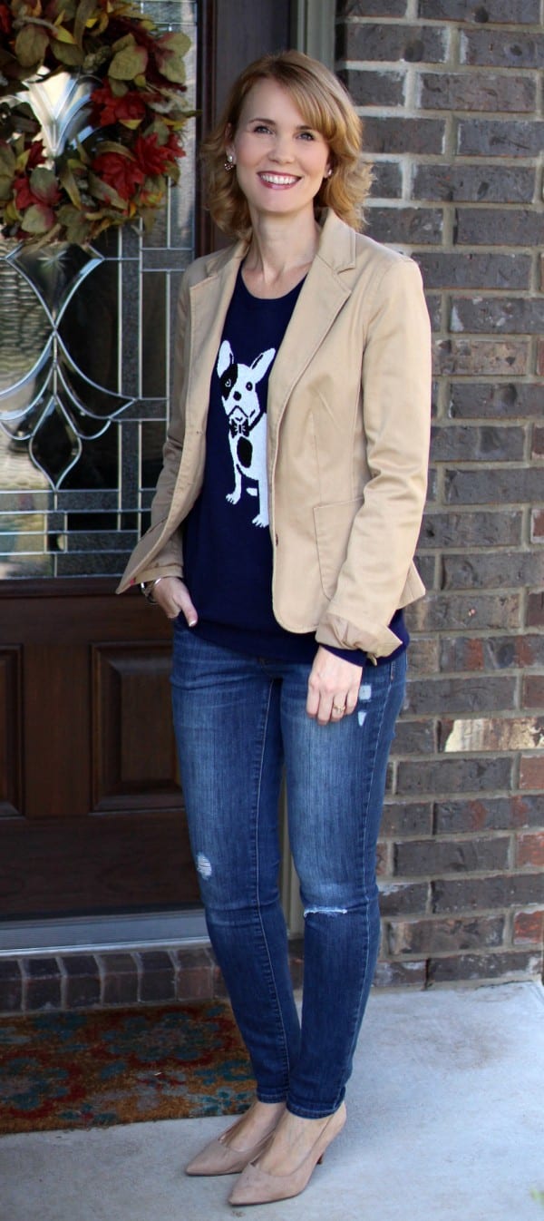 Fall outfit idea - pair a quirky sweater with a blazer, jeans, and heels for a fun fall look.