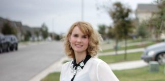 Black and white outfit idea - I styled a pair of black jeans with a white and black long sleeve shirt, burgundy bow flats and a statement necklace.