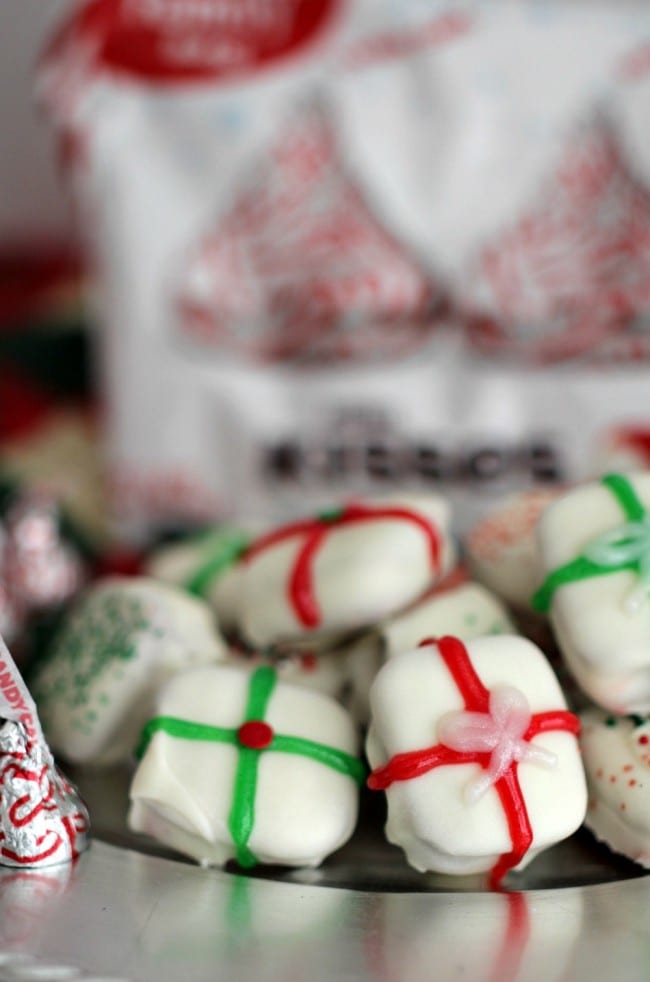 Peppermint Kisses Present Bites- These little bites are fun to make, delicious to eat and are a peppermint party for your taste-buds. With only four easy to find ingredients, these bites are incredibly easy to make!