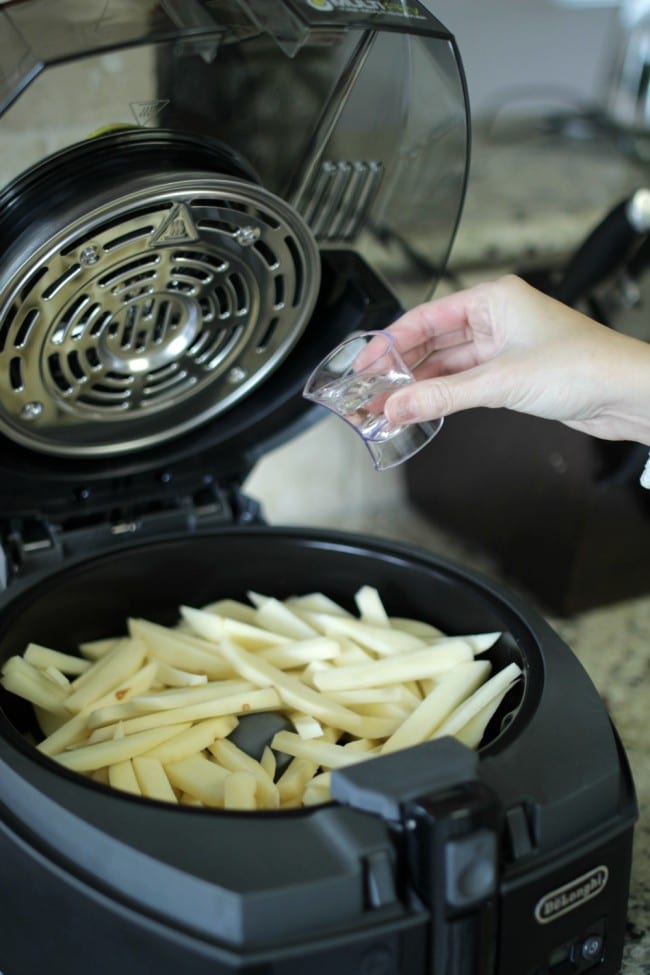 How to make french fries the easy way! Make fresh cut fries with low oil, low mess and low difficulty level. Get ready to dish up some crispy, salty, tasty fries for your family.