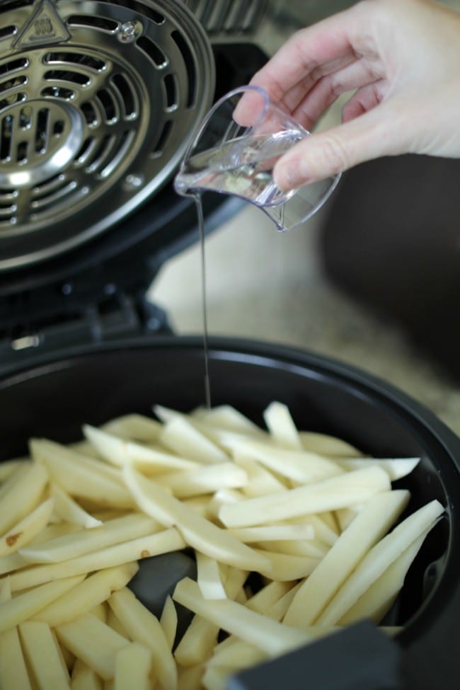 How to make french fries the easy way! Make fresh cut fries with low oil, low mess and low difficulty level. Get ready to dish up some crispy, salty, tasty fries for your family.