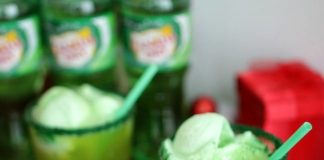 Grinch punch recipe - this punch is perfect for a Grinch viewing party. With its bright green color and deliciously sweet flavor and crunch from the sugar crystals, you can't go wrong. This might even make the Grinch smile.