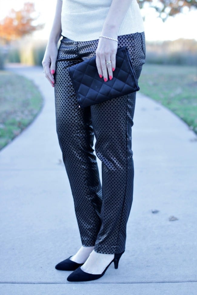 Looking for an office party outfit? How about a pair of fancy pants, a glittery sweater and strappy heels?