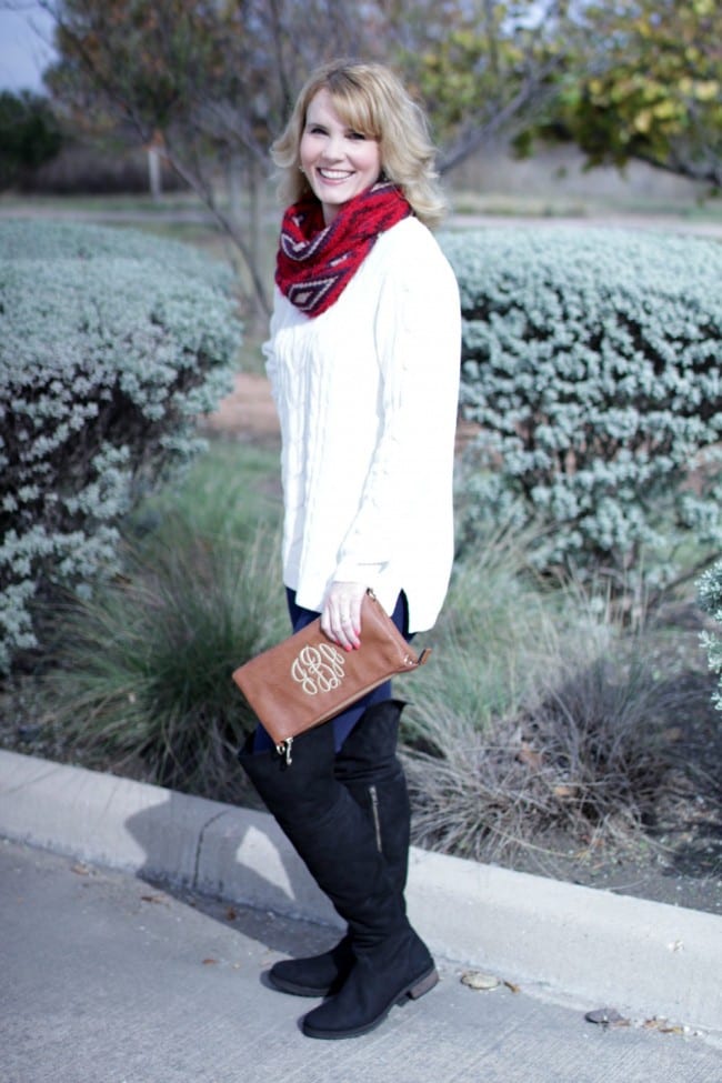 Pair a white chenille sweater with jeans, OTK boots and a brightly colored scarf for a pop of color.