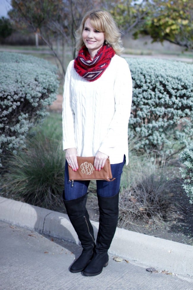 Pair a white chenille sweater with jeans, OTK boots and a brightly colored scarf for a pop of color.