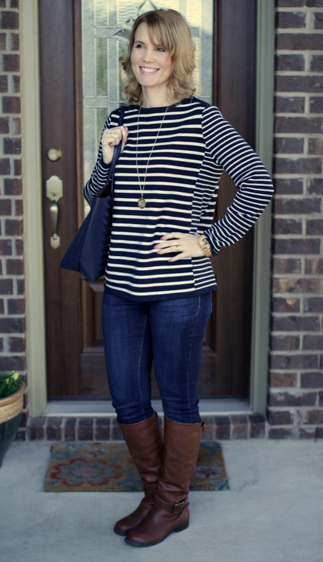 Casual Outfit idea - pair a striped shoulder-zipped pullover with your favorite jeans and riding boots.