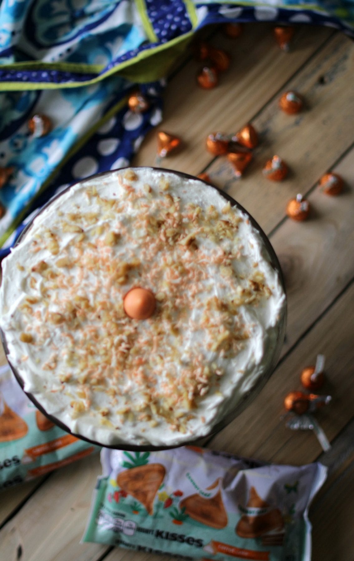 This Carrot Cake Cream Cheese Trifle features an important and tasty ingredient that will make your taste-buds dance -- Hershey's Kisses Carrot Cake Candy!