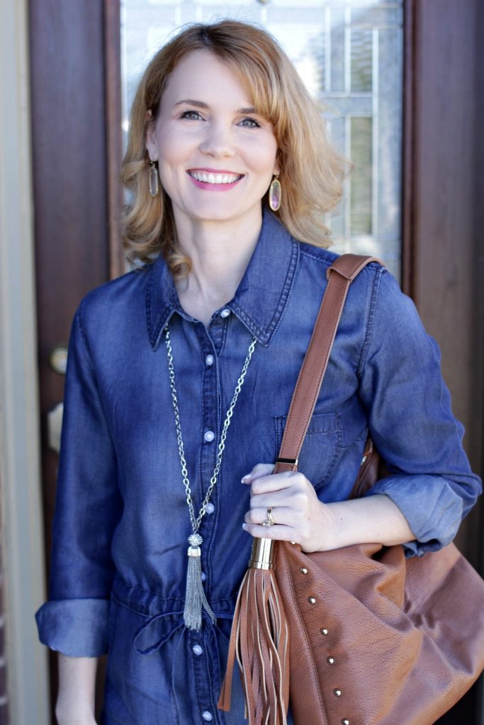 Denim Dress Outfit - wear a pair of caged wedge sandals and a long tassel necklace for a fun spring outfit idea.