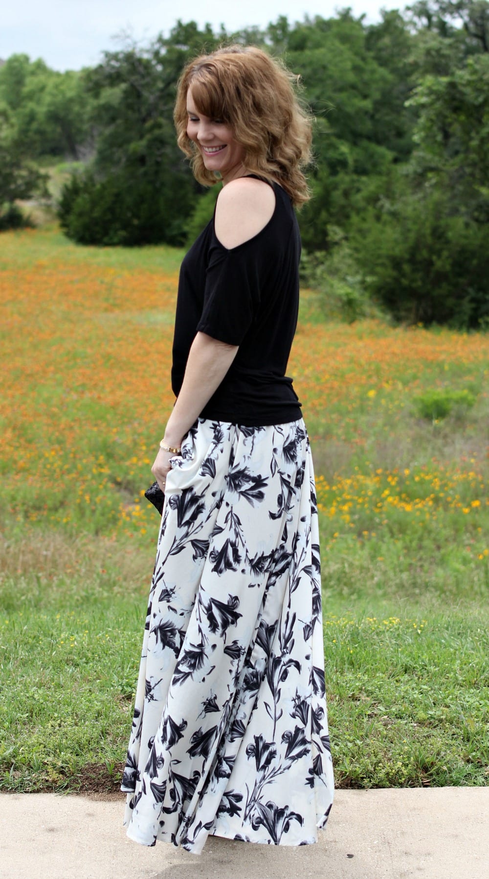 A dressed up maxi skirt outfit - break out the off the shoulder shirt or one with shoulder cutouts, pair it with a maxi skirt, wedges, clutch and some pretty accessories for the perfect date night summer outfit.