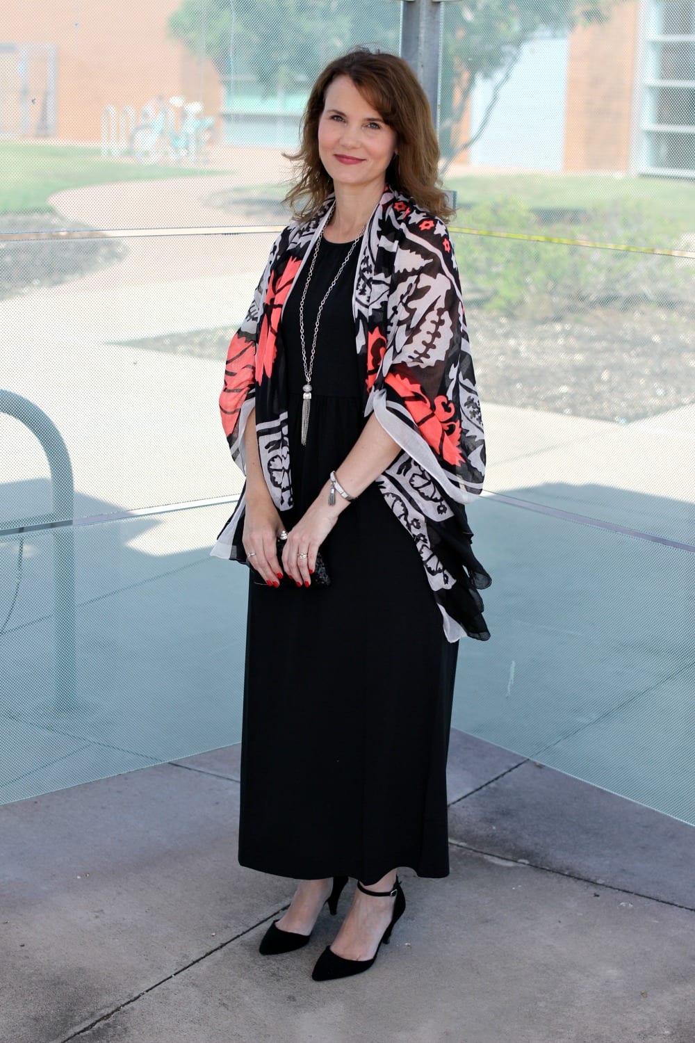 Looking for black maxi dress outfit ideas? Here are two ways to wear one: dressed up and down. This is the perfect versatile dress for summer and even into early fall. 