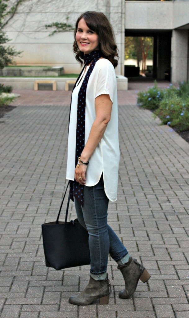 Fall outfit idea: Wear a skinny scarf with a tunic shirt, boyfriend jeans and a pair of fall boots in olive.