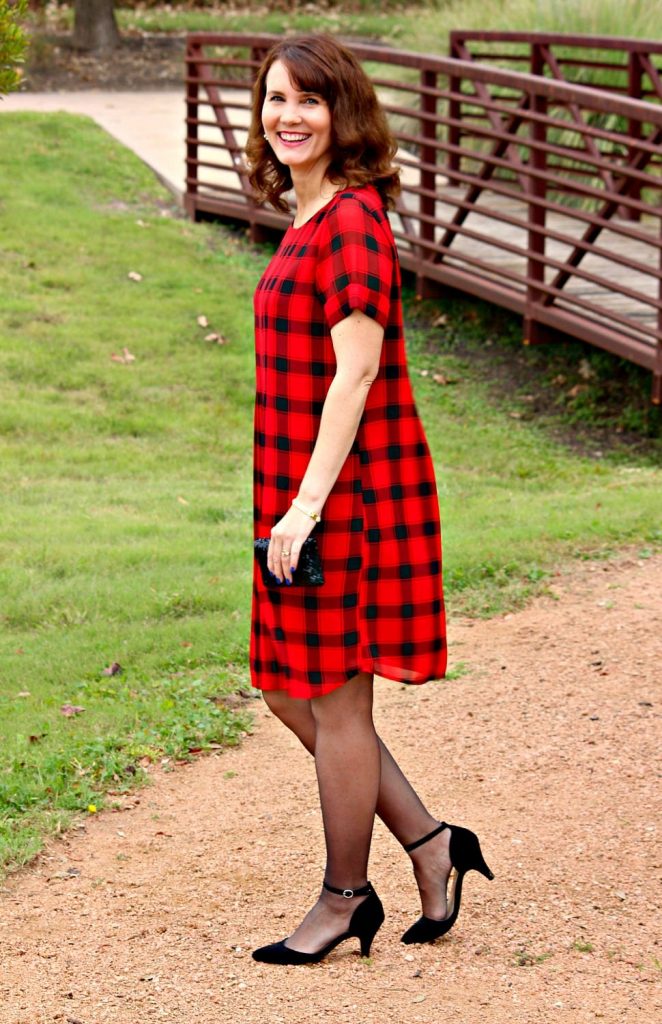 If you're looking for a Holiday dress that's modest, comfortable and covers in all the right places, the Buffalo Plaid Pleated Dress is for you.