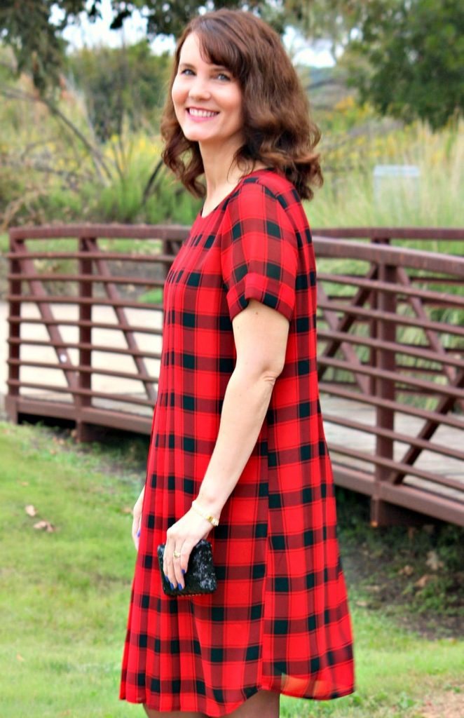 If you're looking for a Holiday dress that's modest, comfortable and covers in all the right places, the Buffalo Plaid Pleated Dress is for you.