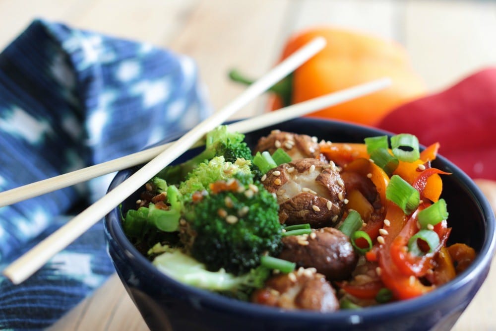This pepper, broccoli, and whole mushroom stir fry recipe is so incredibly easy and full of amazing flavors. Whether it's meatless Monday or you're making dinner for a house full of vegetarians, this is a crowd-pleaser!