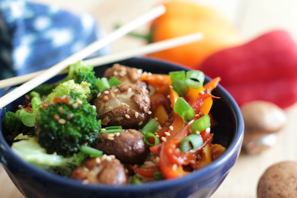 This pepper, broccoli, and whole mushroom stir fry recipe is so incredibly easy and full of amazing flavors. Whether it's meatless Monday or you're making dinner for a house full of vegetarians, this is a crowd-pleaser!