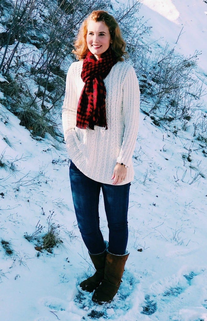 Christmas outfit idea: Ivory chenille sweater, buffalo plaid scarf, jeans and boots.