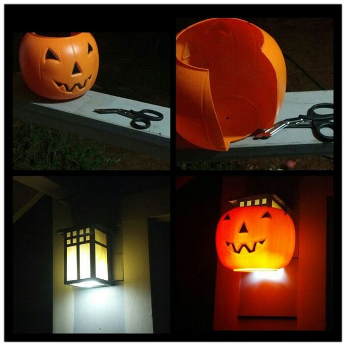 A plastic pumpkin placed over a front porch light